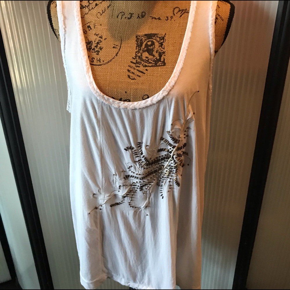 White sleeveless embellished top. Calvin Klein.